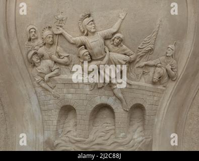 Exécution de Saint Florian en le noyant dans la rivière Enns représentée sur la colonne de Saint Florian (Stĺp svätého Floriána) sur la place Floriánske (Floriánske námestie) à Bratislava, Slovaquie. La colonne conçue par Krištof Rentfort a été construite en 1732 comme un mémorial du grand feu à Bratislava. Banque D'Images