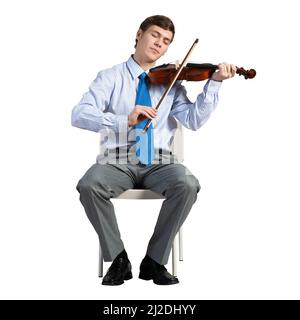 homme d'affaires sur une chaise avec violon Banque D'Images