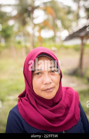 Portrait d'une femme sur l'île de Sulawesi, Indonésie, Asie. Banque D'Images