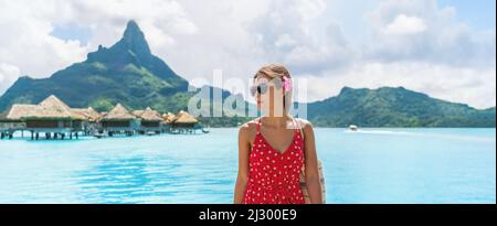 Bora Bora vacances de voyage. Femme en Polynésie française sur le paradis Motu sur Bora Bora avec le Mont Otemanu en arrière-plan. Les gens en vacances de rêve Banque D'Images