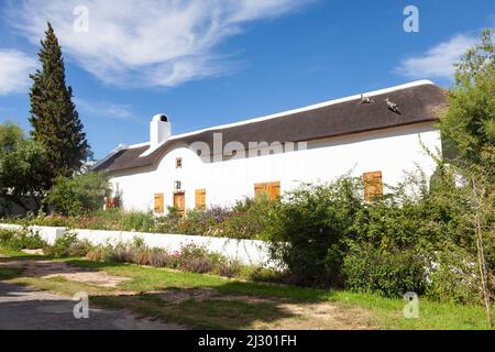 Longue maison historique Cape Dutch à Tulbagh, à l'ouest du Cap Winelands, Afrique du Sud. Banque D'Images