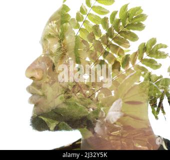 Un portrait à profil d'exposition double d'un homme combiné au feuillage. Banque D'Images