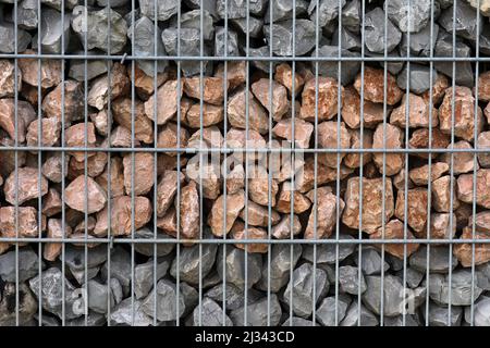 Clôture avec gabions et pierres Banque D'Images