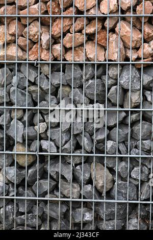 Clôture avec gabions et pierres Banque D'Images