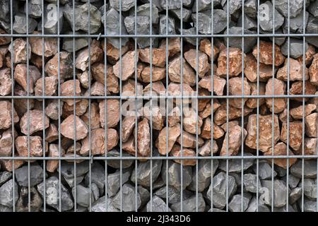 Clôture avec gabions et pierres Banque D'Images