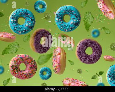 les beignets multicolores doux levent sur fond vert, les saupoudrés de sucre volent autour Banque D'Images