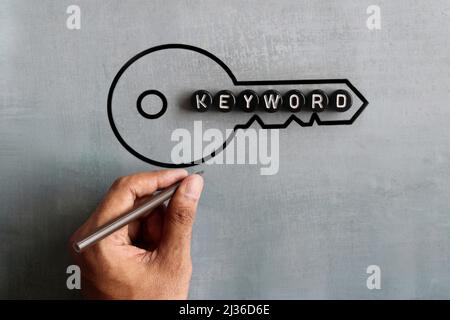 Mot-CLÉ de texte et image de dessin de la clé. Optimisation des moteurs de recherche, concept de recherche Web. Banque D'Images