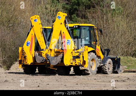 Excavateurs de chargeuses-pelleteuses JCB 3CX à Diggerland, Castleford, Yorkshire, Angleterre Banque D'Images