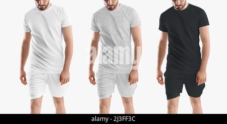 Ensemble de t-shirt et short de sport avec short de compression. Vêtements de sport blancs, noirs et gris chiné. Modèle de présentation Banque D'Images