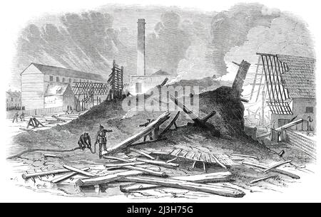 Ruines du Grand incendie à Bermondsey, [à Londres], 1850. Les pompiers sur la scène '... d'une conflagration très étendue, probablement la plus grande qui s'est produite dans le district depuis des années. Les locaux sur lesquels l'incendie s'est produit étaient ceux de MM. H. N. et H. Eason, tanneurs et commodes en cuir... la maison-moteur se trouvait au milieu de la gamme principale, une grande grange, dans laquelle étaient 300 charges d'écorce, de la valeur de plus de &#xa3;5000, être à droite ou au nord, et l'entrepôt de cuir et un autre magasin d'écorce à gauche ou au sud. Presque immédiatement sur la découverte Banque D'Images