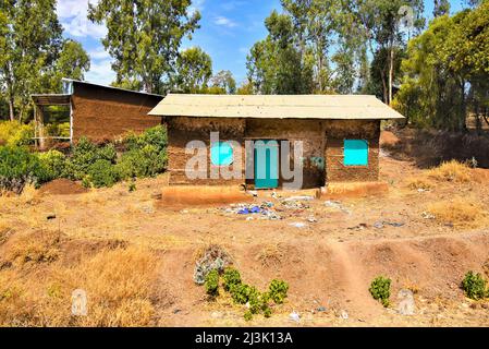 Maison et grange sur une ferme dans les Highlands d'Ethiopie; Ethiopie Banque D'Images