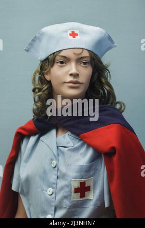 Mannequin vêtu comme infirmière de la Croix-Rouge américaine servi en 1945 à Reims exposé au Musée de la reddition (Musée de la Redition) à Reims, France. Banque D'Images