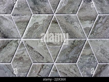 Carreaux de céramique gris avec texture en pierre naturelle. Arrière-plan pour le design et la décoration. Banque D'Images