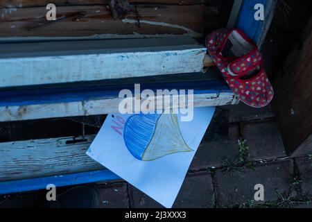 Chaussures pour enfants et drapeau de l'Ukraine, la guerre Banque D'Images