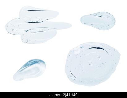 Traces de gel de sérum liquide transparent avec des bulles isolées sur fond blanc Banque D'Images