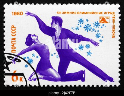 RUSSIE - VERS 1980 : un timbre imprimé en Russie montre Freestyle Skating, Jeux olympiques d'hiver de 1980, Lake Placid, NY, vers 1980 Banque D'Images