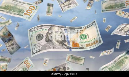 Pluie d'argent - les dollars américains tombent du ciel Banque D'Images