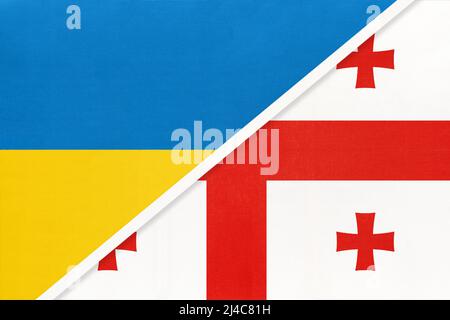 Ukraine et Géorgie, symbole du pays. Drapeaux nationaux ukrainien contre géorgien. Relations et partenariat entre deux pays. Banque D'Images