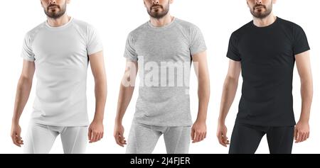 Ensemble de maquettes blanches, noires et grises à motif chiné d'un t-shirt et d'un pantalon de sport blanc pour hommes. Modèle SPORTSWEAR isolé en arrière-plan. Banque D'Images