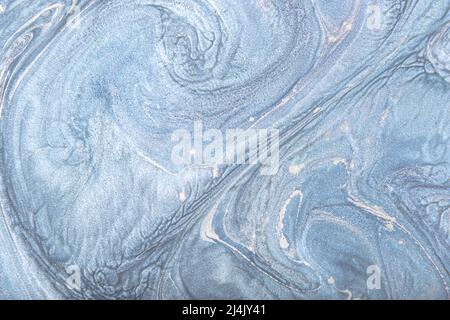 Encre de marbre colorée. Fond abstrait de texture de motif de marbre bleu. Peut être utilisé pour l'arrière-plan ou le papier peint. Banque D'Images