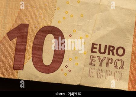 Monnaie de l'Angleterre au Royaume-Uni - un billet rouge de dix (10) livres sur un très gros plan. Bureau de change. Banque D'Images