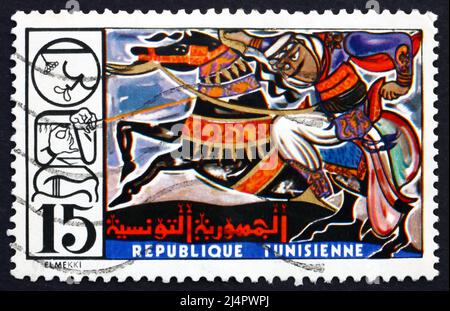 TUNISIE - VERS 1975 : un timbre imprimé en Tunisie montre Horse and Rider, Artisan and leurs œuvres, vers 1975 Banque D'Images