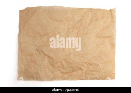 feuille de papier de cuisson marron isolée sur fond blanc, vue du dessus, parchemin pour la cuisson culinaire Banque D'Images