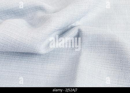 Drap de lit bleu clair - toile de fond ondulée. Ressources graphiques Banque D'Images