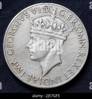 Inde : Médaille du service en Inde 1939 - 1945 (contre), décernée aux Forces indiennes pour au moins 3 ans de service non opérationnel en Inde entre septembre 1938 et septembre 1945. Ce côté montre le roi George VI, à l'époque nommé roi de Grande-Bretagne et empereur de l'Inde. Banque D'Images