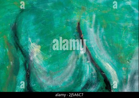 Un mur en stuc peint dans les tons d'Aqua et de verts Banque D'Images