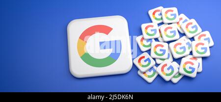 Alphabet (société mère de Google) partage 20:1. Une grande tuile avec un logo Google et 20 petites tuiles. Concept pour un partage de 20:1. Banque D'Images