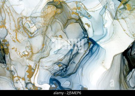 Vagues dorées. Image abstraite riche et lumineuse. Luxe abstrait fluide art peinture alcool encre. Arrière-plan bleu glace or scintille. Une très belle Banque D'Images