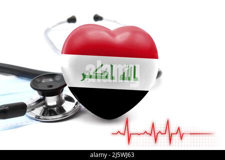 Drapeau de l'Irak sous la forme d'un coeur à côté d'un stéthoscope, le concept du système de santé mondial Banque D'Images