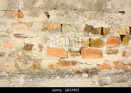 Mur de briques avec des rayures de béton. Grunge arrière-plan Banque D'Images