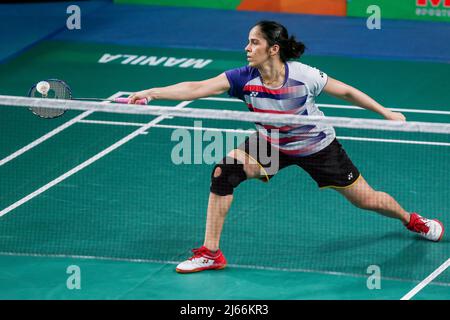 Manille, Philippines. 28th avril 2022. Saina Nehwal, de l'Inde, participe au match rond des femmes célibataires 2nd contre Wang Zhiyi, de Chine, aux Championnats d'Asie de badminton 2022 à Manille, aux Philippines, le 28 avril 2022. Crédit: Rouelle Umali/Xinhua/Alamy Live News Banque D'Images