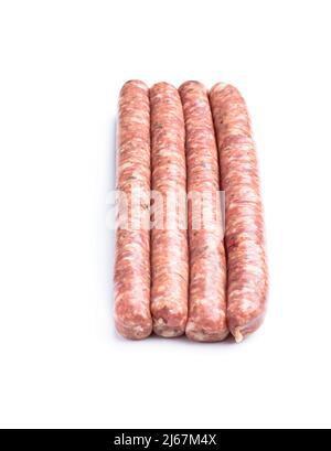 Fines saucisses de porc isolées sur fond blanc Banque D'Images