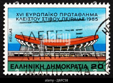 GRÈCE - VERS 1985: Un timbre imprimé en Grèce montre le stade de la paix et de l'amitié, Neo Faliro, Pirée, Championnat européen d'athlétisme en intérieur Banque D'Images