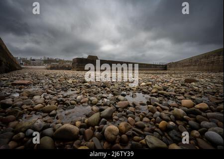 Le port rempli de pierre à Portgordon près de Buckie sur la côte de Moray. Banque D'Images