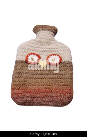 Une housse pour bouteille d'eau chaude en maille Woolen Owl. Banque D'Images