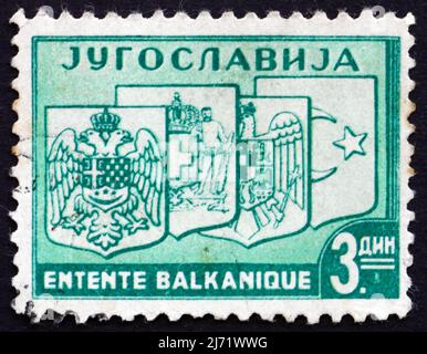 YOUGOSLAVIE - VERS 1937 : un timbre imprimé en Yougoslavie montre les Coats d'armes de Yougoslavie, Grèce, Roumanie et Turquie, Balkan Entente, vers 1937 Banque D'Images