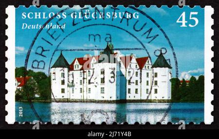 ALLEMAGNE - VERS 2013: Un timbre imprimé en Allemagne montre le château de Glucksburg, est un château d'eau dans la ville de Glucksburg, Allemagne, vers 2013 Banque D'Images