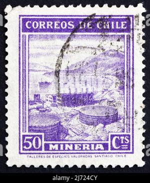 CHILI - VERS 1938 : un timbre imprimé au Chili montre Mining, Industry, vers 1938 Banque D'Images