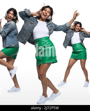 Portrait de Tripptic d'une jeune femme à la mode qui porte des écouteurs et danse sur fond blanc Banque D'Images