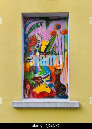 Image peinte de couleurs vives sur une fenêtre virée, Allemagne Banque D'Images