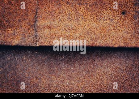 Texture du métal rouillé. Vieux garage. Maison abandonnée. Grince la texture du métal. Banque D'Images