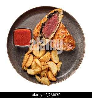 Plat de bœuf wellington isolé avec pomme de terre Banque D'Images