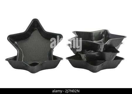Moules à pâtisserie en forme d'étoile, métal à revêtement antiadhésif, isolés sur fond blanc, faible profondeur de champ Banque D'Images