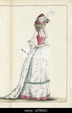 Femme à la mode en cuir de taffetas rose, cheveux en anglaises, fichu de gaze, robe de taffetas blanche avec corset rose, jupons blancs, pantoufles roses. Gravure en copperplate de couleur main de Jean-Antoine le Brun ou du Journal de la mode et du gout de Lebrun-Tossa, anciennement Cabinet des modes, chez Buisson, Paris, et Joseph le Boffe, Londres, 13me Cahier, 25 juin 1790. Banque D'Images