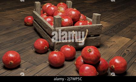 grenades, fruits juteux dans une caisse sur fond de bois Banque D'Images