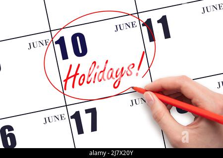 10th jour de juin. Dessiner à la main un cercle rouge et écrire le texte vacances sur le calendrier date 10 juin. Date importante. Mois d'été, jour de l'année Banque D'Images